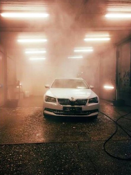 Technician working on car